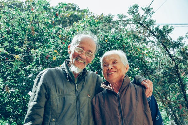 Smiling elderly couple